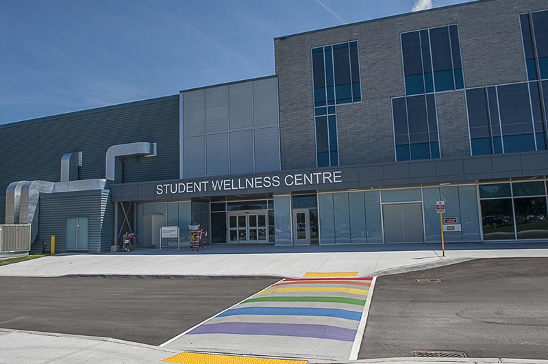 Student Wellness Centre exterior and rainbow crosswalk