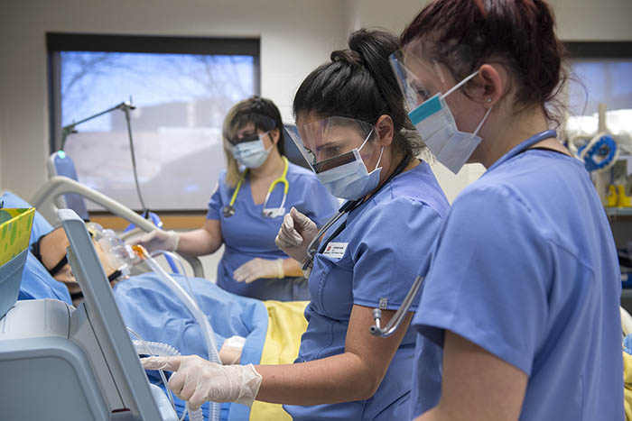 Fanshawe Respiratory Therapy students in lab with personal protective equipment.